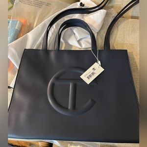 Brand new navy medium telfar